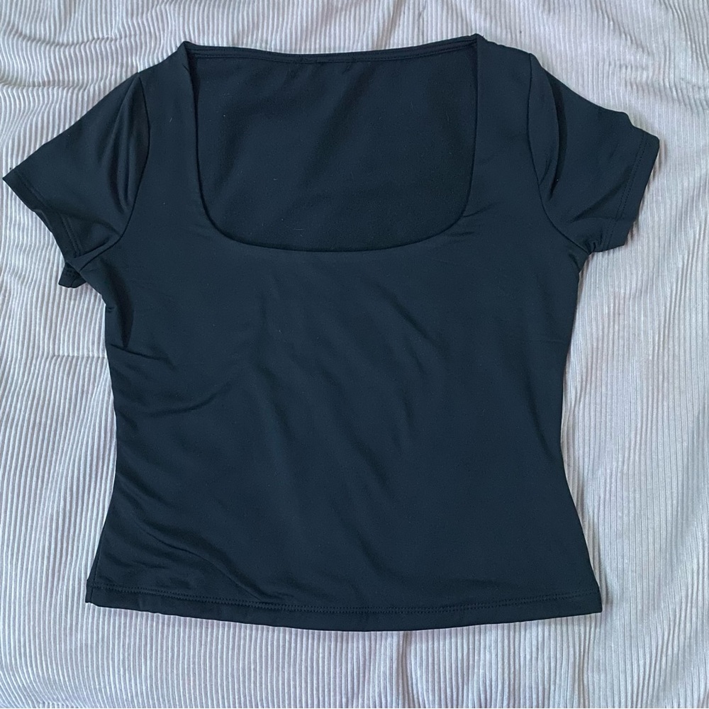 Black top with a square neckline
